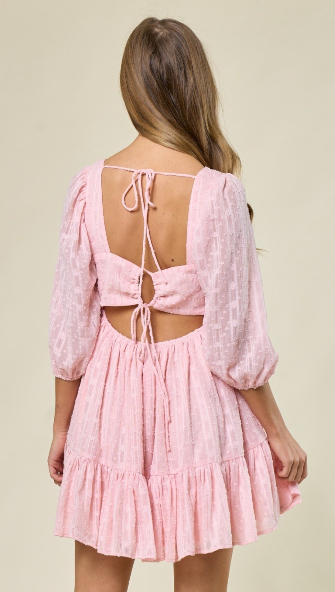 Textured lace mini dress in pink