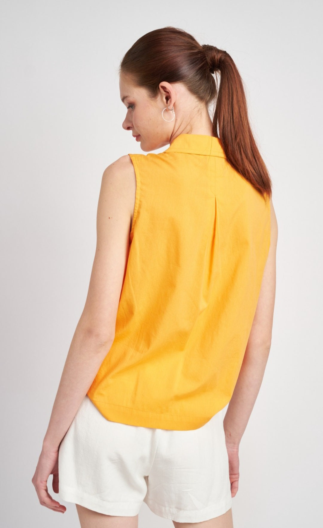 Collared sleeveless women button-down shirt